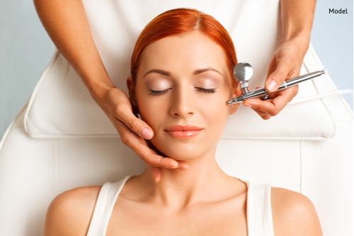 closeup portrait of lovely redheaded woman with closed eyes getting oxygen therapy-img-blog