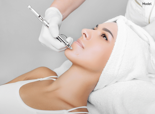 face of beautiful woman getting oxygen facial treatment-img-blog