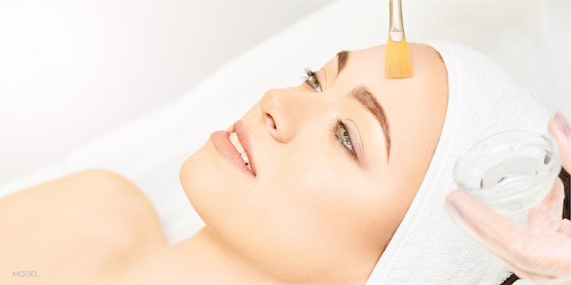 Women getting a chemical peel with her aesthetician.