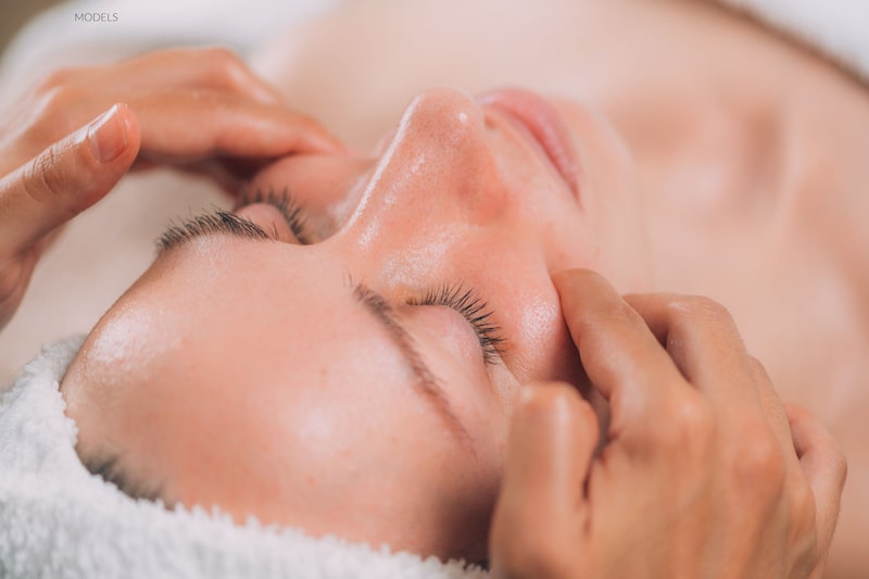 Close-up image of a woman having a facial massage