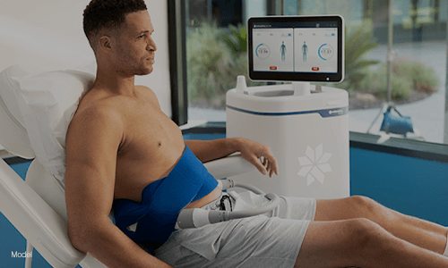 Man getting Coolsculpting treatment on abs