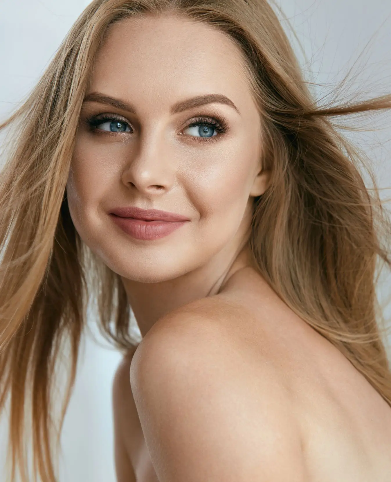 woman with full lips and smooth skin