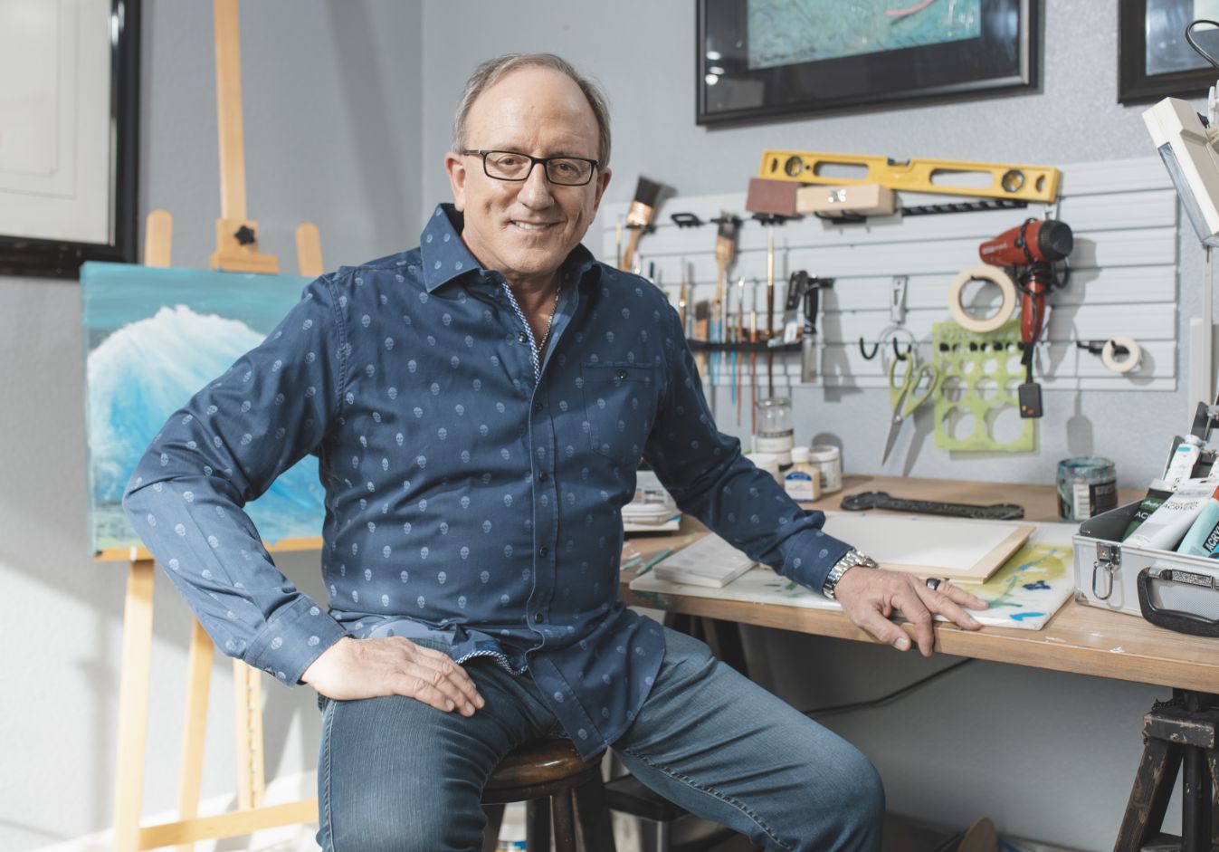 Dr. Bonaldi sitting in his artist room